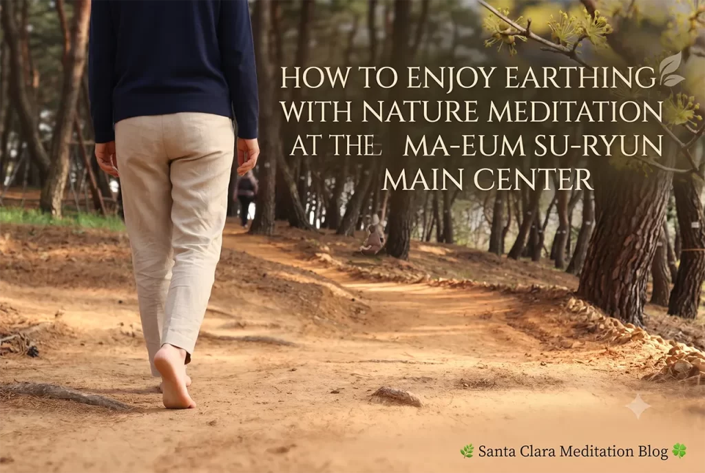 A person walking barefoot on the red clay pine forest path at the Ma-eum Su-ryun Main Center
